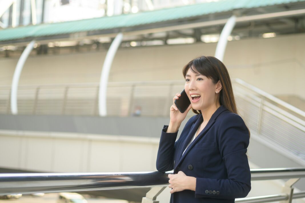 Business woman on mobile phone