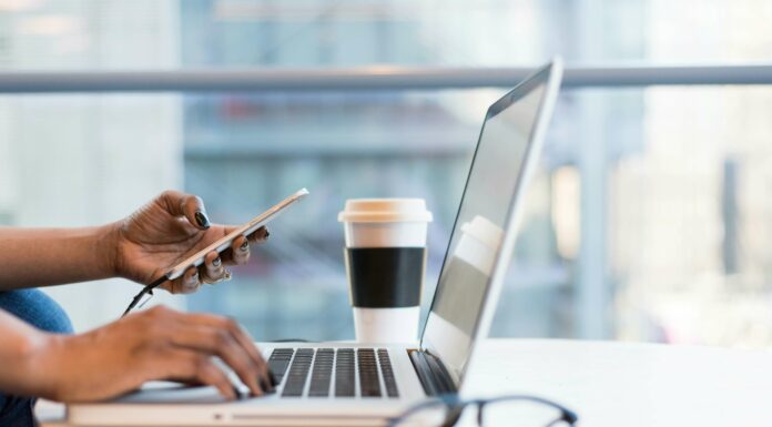 What Are the Key Advantages of VoIP for Businesses? Working laptop and mobile