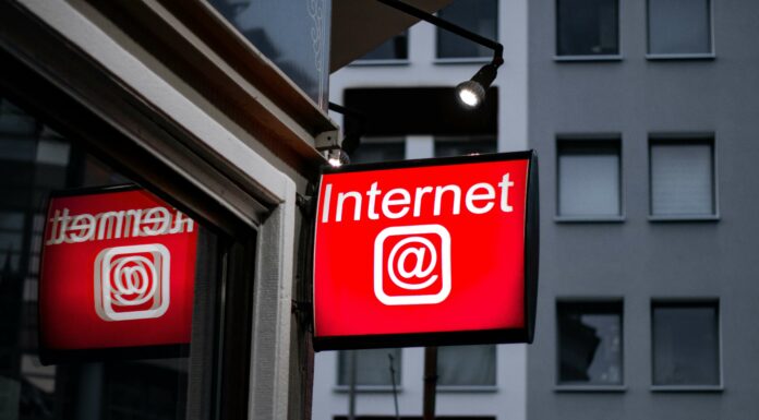 What Are the Key Differences Between Broadband and Dial-Up Internet? Internet sign on store front