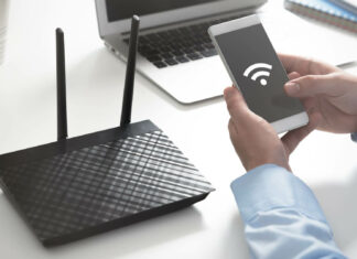 Is Cable Internet Faster Than DSL? Mobile Phone Connecting To Broadband Router