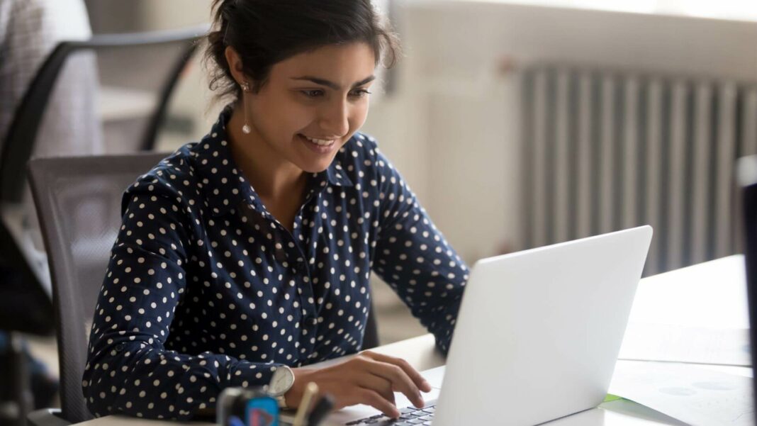 Business Owner Using Laptop
