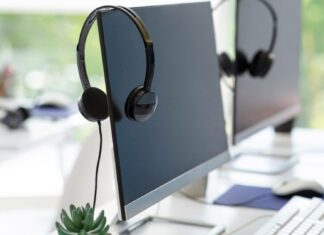 How Does VoIP Influence Work-Life Balance? Headset On Desktop