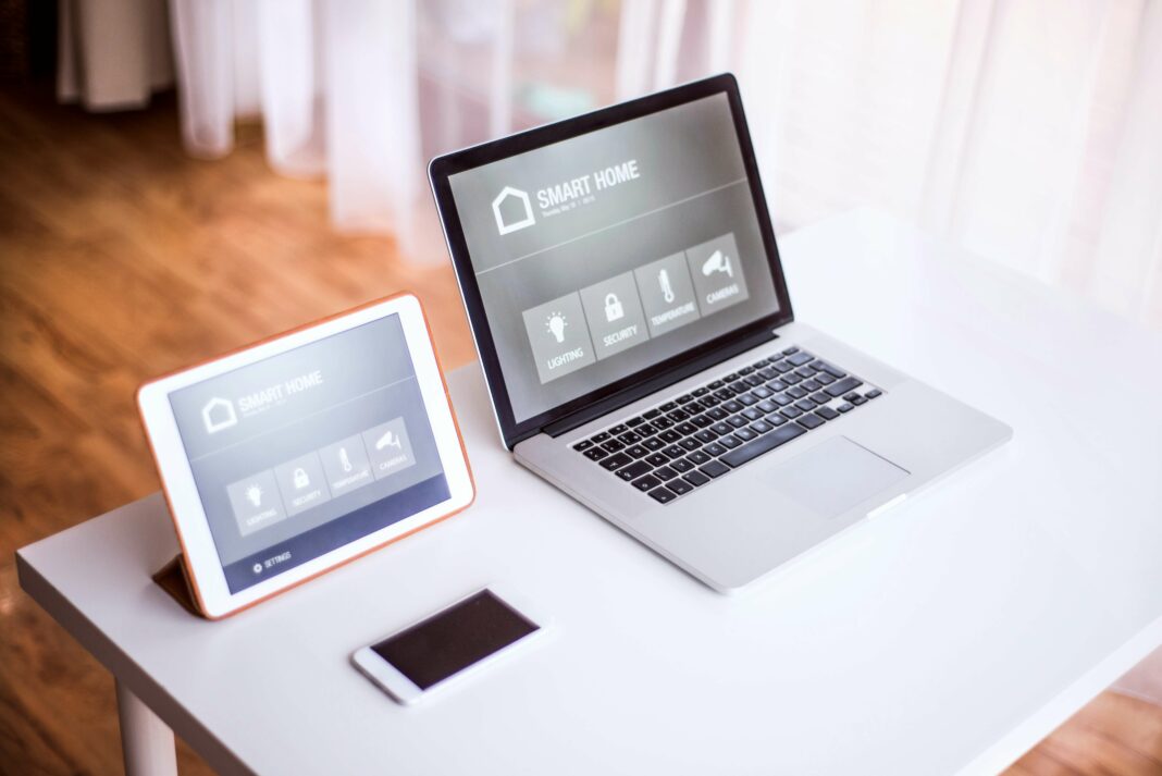 How Does Broadband Internet Support Smart Home Devices Smart device on laptop and iPad