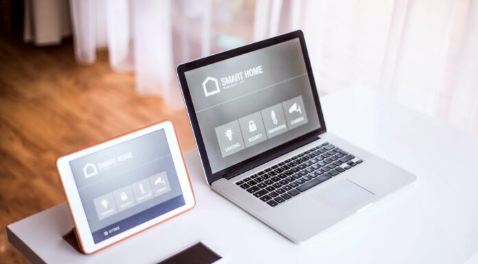 How Does Broadband Internet Support Smart Home Devices? Smart device on laptop and iPad
