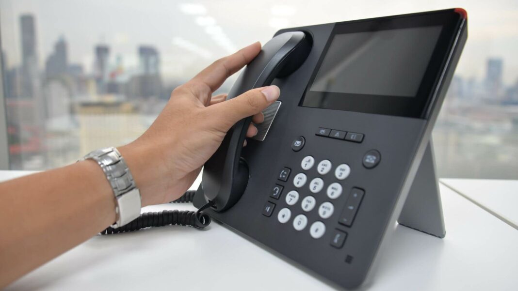 Person Using VoIP System Person Using VoIP System
