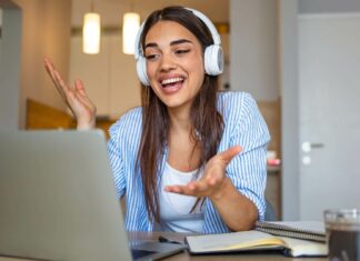 Is VoIP Suitable for E-commerce Customer Support? Woman Using A VoIP System