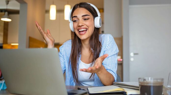 Is VoIP Suitable for E-commerce Customer Support? Woman Using A VoIP System