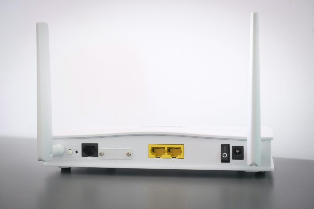 Photo of the back of a white wifi router