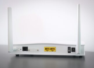 Is Mobile Broadband a Viable Alternative to Fixed-Line Internet? Photo of the back of a white wifi router
