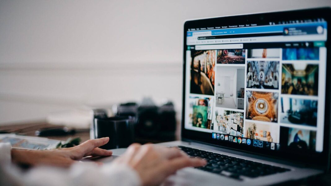 Person Typing On Computer
