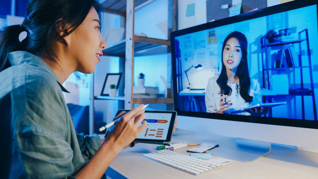 Top 10 Best Business VoIP Providers Two women talking to each other via video call