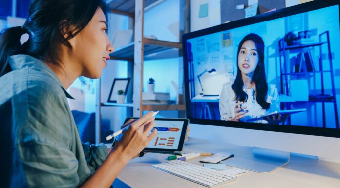 Top 10 Best Business VoIP Providers Two women talking to each other via video call