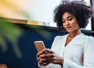 What Are The Privacy Concerns With Mobile Broadband? Woman Texting On Phone