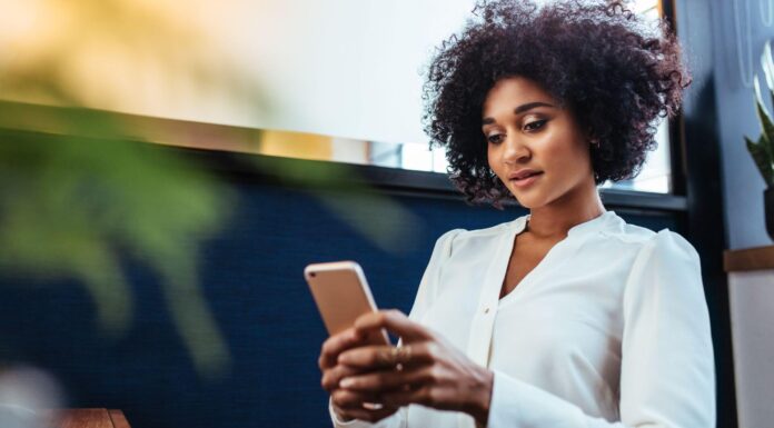 What Are The Privacy Concerns With Mobile Broadband? Woman Texting On Phone