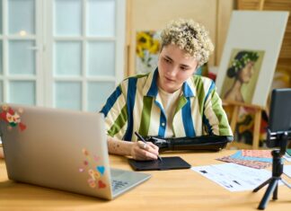 Can Mobile Broadband Bridge the Homework Gap in Education? Boy sitting at his desk doing school work online