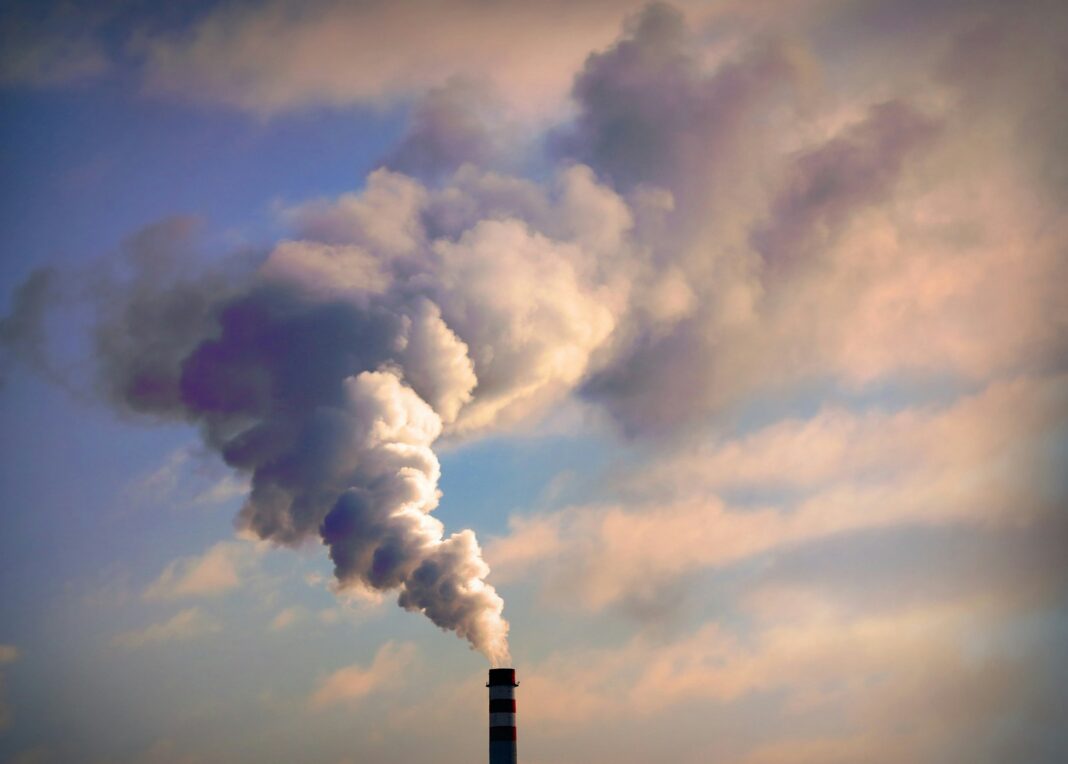 A factory emitting harmful gas into the sky