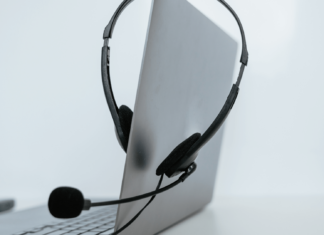 bOnline Recognised At 2024 Engage Awards Headset On Laptop