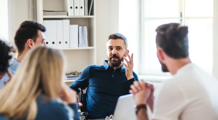 Tips To Secure Your Business Broadband A group of people sitting in an office talking
