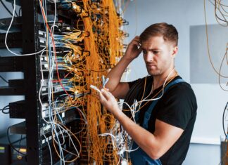 What Are the Maintenance Requirements for VoIP Systems? A man standing at