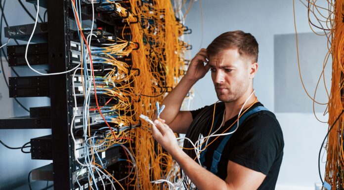 What Are the Maintenance Requirements for VoIP Systems? A man standing at