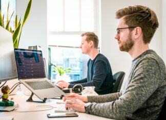5 Common Mistakes to Avoid When Switching to VoIP two-men-working-on-their-laptops