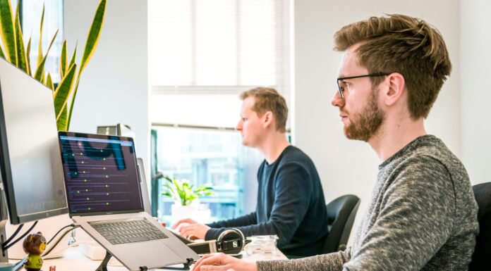 5 Common Mistakes to Avoid When Switching to VoIP two-men-working-on-their-laptops