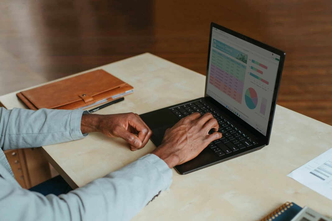 man-working-at-his-desk-on-laptop