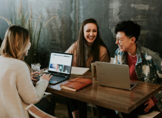 Porting Your Landline Phone Number to VoIP three-people-working-at-a-desk