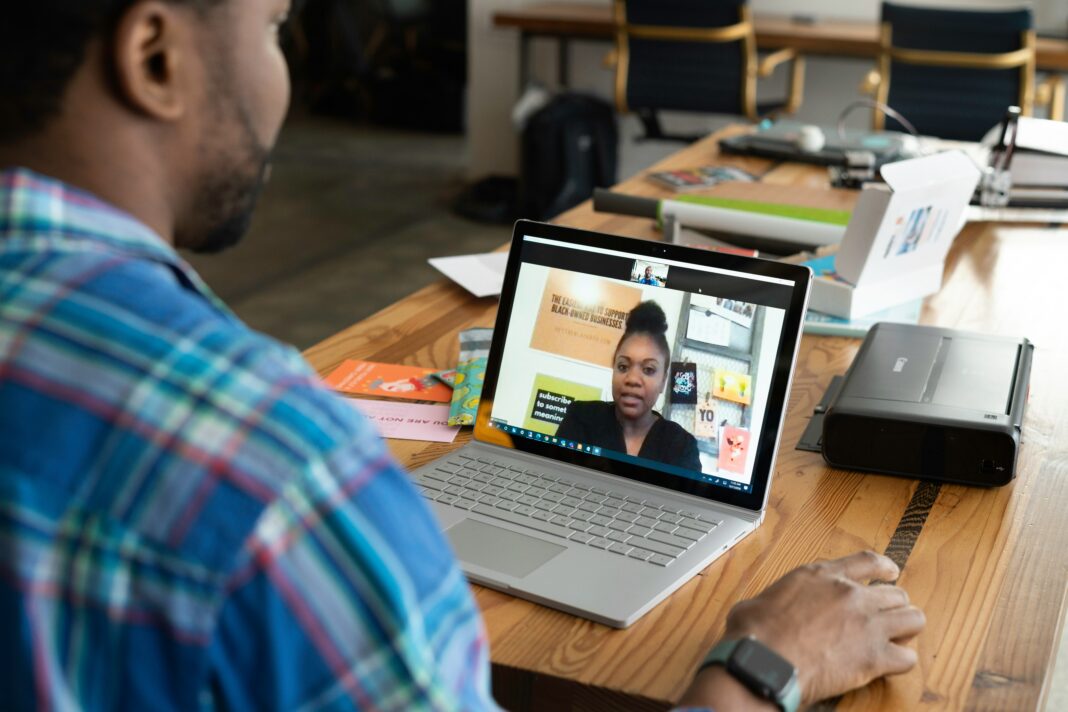 What To Look For When Considering A Broadband Service Provider man-having-a-meeting-on-his-laptop