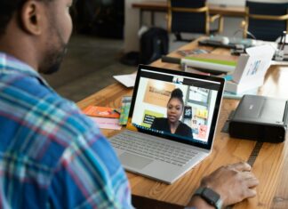 What To Look For When Considering A Broadband Service Provider man-having-a-meeting-on-his-laptop