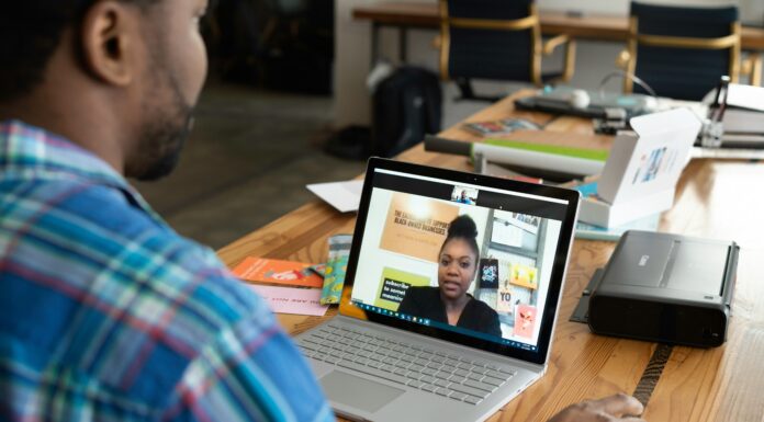 What To Look For When Considering A Broadband Service Provider man-having-a-meeting-on-his-laptop