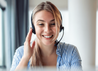 7 Steps To Transition Your Office To VoIP Woman Using Headset