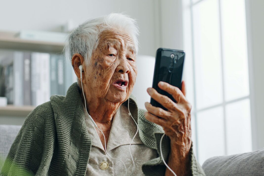 elderly-man-using-his-broadband-connection-to-keep-in-touch-with-his-family