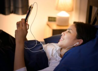Broadband Data Caps: How They Affect Your Internet Usage woman-streaming-videos-with-broadband-data-caps