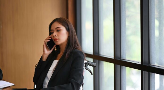 How VoIP Enhances Customer Service in UK Banks banker using voip phone