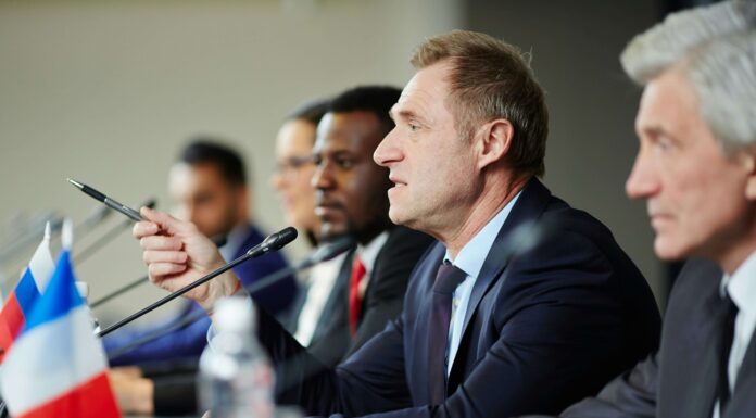 The Government’s Role In Expanding Broadband Access government-officials-talking-about-expanding-broadband-access
