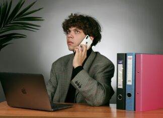 VoIP Phone Systems with 50+ Features for Small UK Businesses man-making-a-voip-phone-call