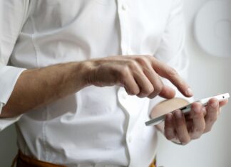 Can VoIP Be Used for Real-Time Collaboration Tools? man-using-voip-instant-messaging-features