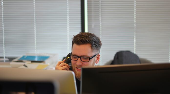 How Does VoIP Handle Call Recording for Compliance? voip-phone-call-being-recorded
