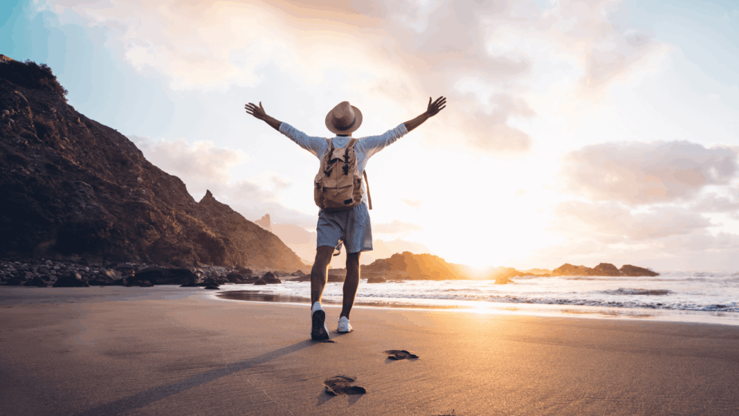 Traveller on beach care free