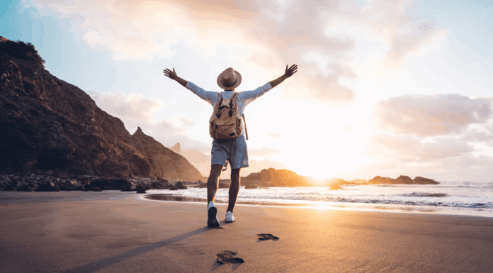 eSIMs: A Game-Changer For Remote Work And Business Travel Traveller on beach care free