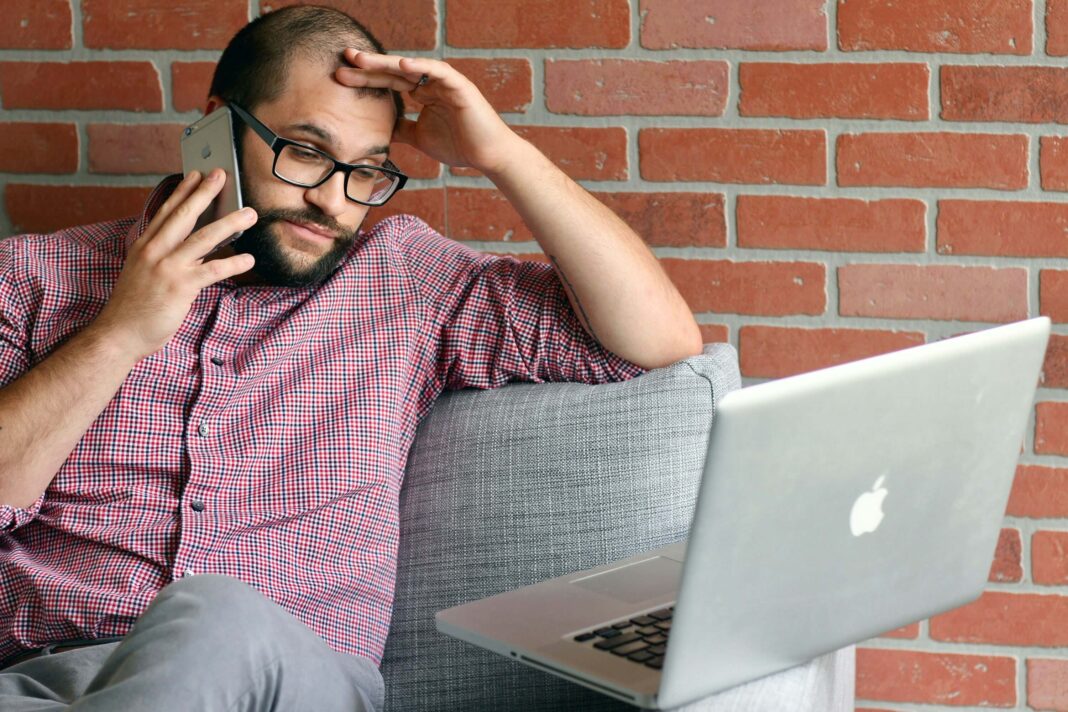 frustrated man using esim