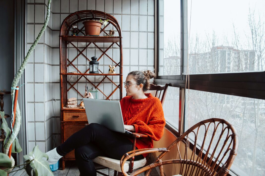 girl sitting enjoying home broadband