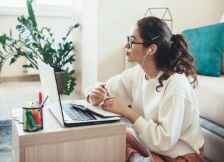 Top Causes of Slow Broadband (And How to Fix Them) home internet use laptop lounge