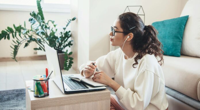 Top Causes of Slow Broadband (And How to Fix Them) home internet use laptop lounge