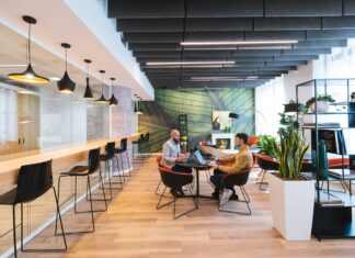 How VoIP Supports Real Estate Agents in Managing Remote Clients client-meeting-in-modern-and-colourful-office