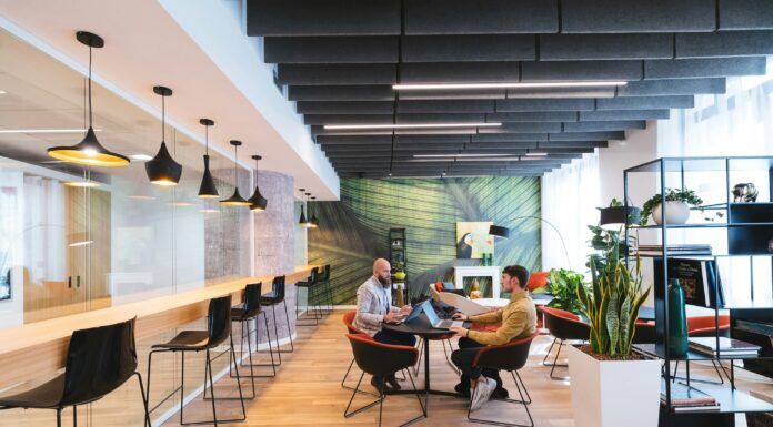 How VoIP Supports Real Estate Agents in Managing Remote Clients client-meeting-in-modern-and-colourful-office
