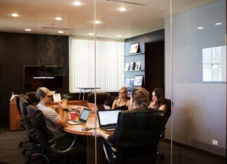The Business Risks of Ignoring VoIP Infrastructure Updates small-meeting-in-meeting-room