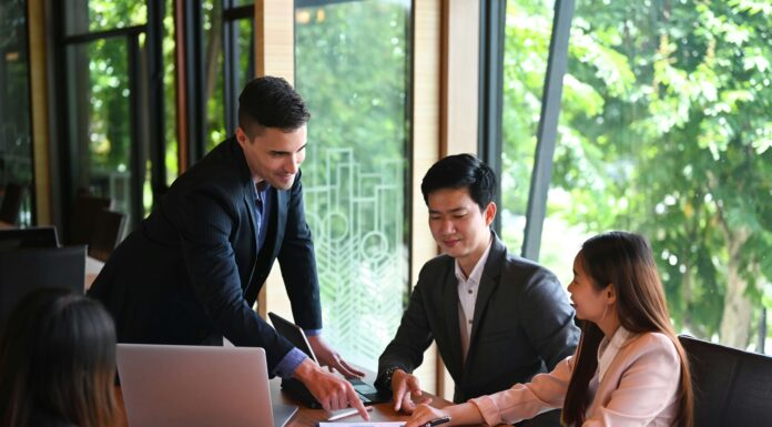 7 Ways Poor Broadband Hurts Business Productivity business-meeting-in-office-with-greenery-in-window