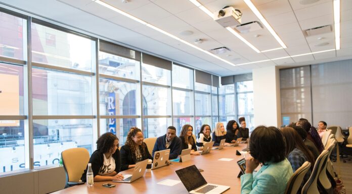 How VoIP Can Streamline Multi-Brand Business Operations large-boardroom-meeting